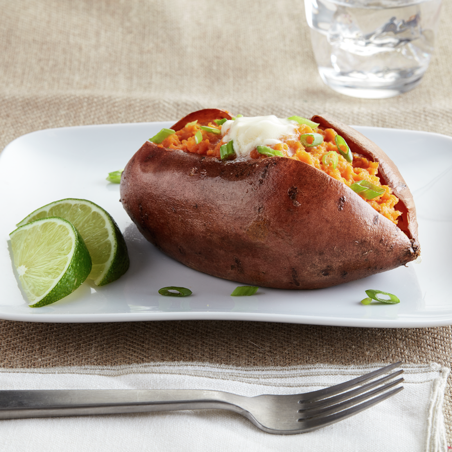 recipe image Buttery Baked Sweet Potatoes With Coconut & Lime